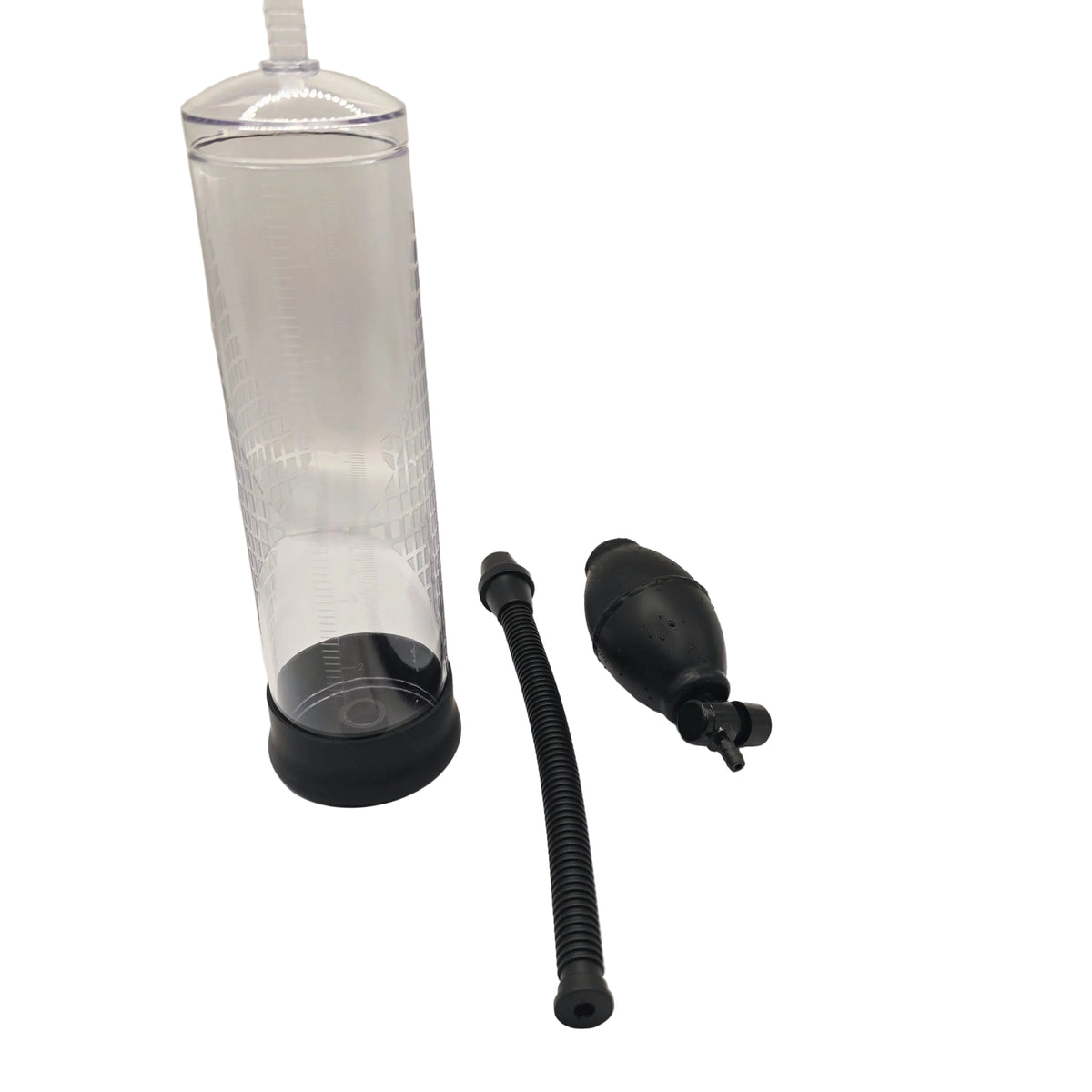A clear cylindrical chamber with a black base, shown with a black corrugated tube and a black bulb pump on a white sheet against a white backdrop.