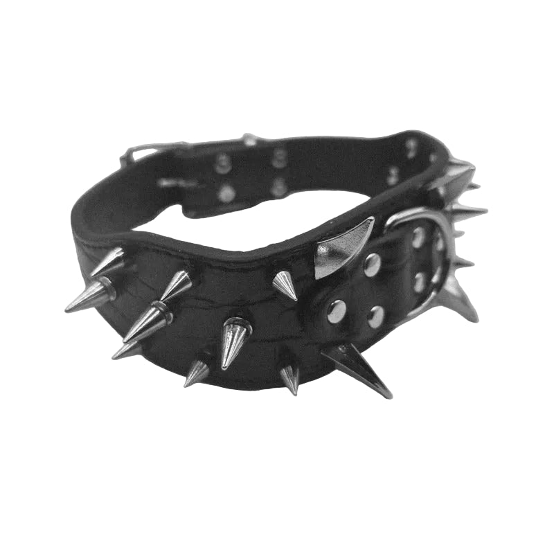 A black leather spiked collar with silver-toned metal spikes and rivets, photographed on a light gray background.