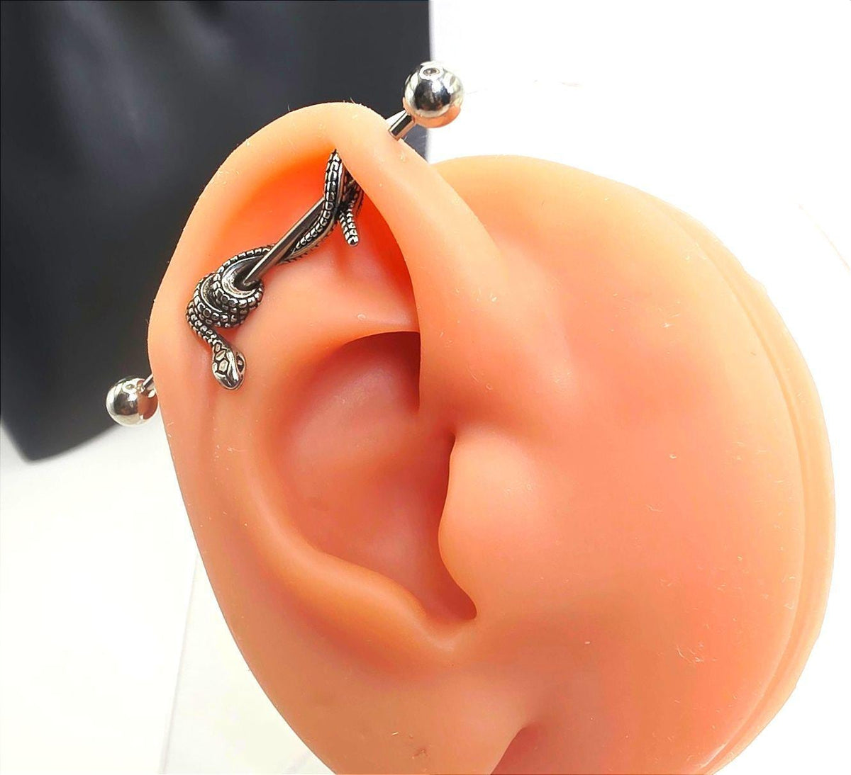 Industrial Barbell Ear Piercing with Snake Design
