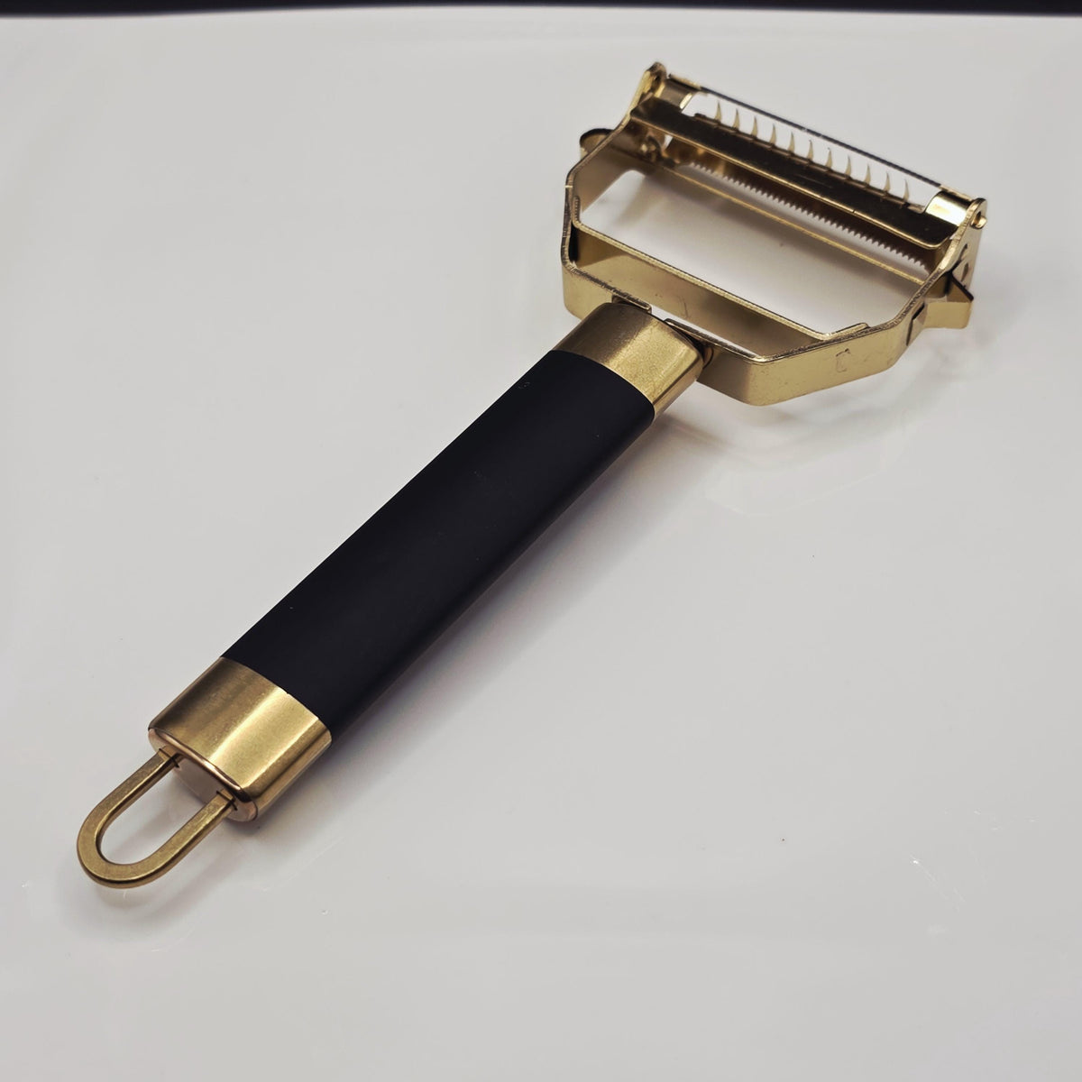 Gold Stainless Steel 4-in-1 Vegetable Peeler – Ergonomic Black Handle Kitchen Gadget