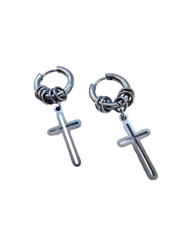 A pair of silver-toned hoop earrings with a coiled wrap detail at the top and a dangling cross charm, shown on a plain white background.